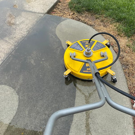 Pressure washing helps restore driveways and walkways